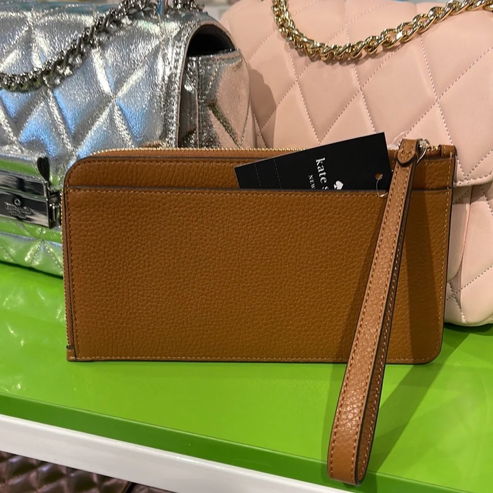 Kate Spade Medium Lucy L-Zip Wristlet Pebble Leather 

Warm Gingerbread 
NWT - Picture 7 of 16